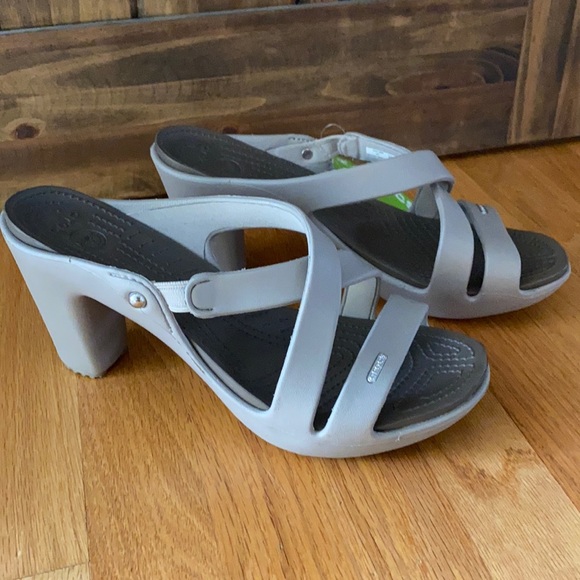 NWT Crocs pewter sandals.